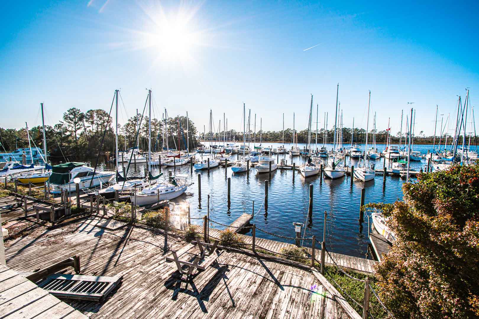A peaceful view of the boat dock at VRI's Waterwood Townhomes in New Bern, North Carolina.